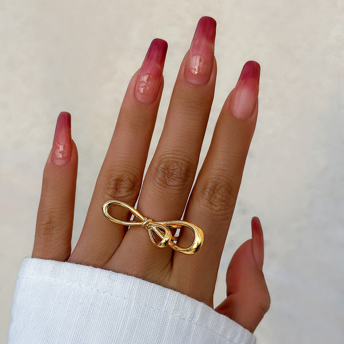 Metallic smooth butterfly ring for women, simple and exaggerated French bow ring