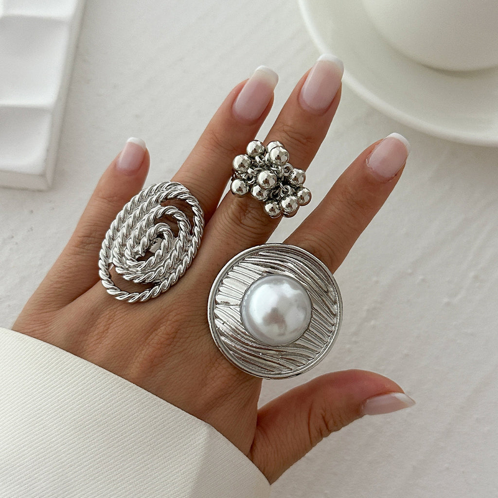 Geometric ripple imitation pearl ring, irregular elliptical alloy winding ring