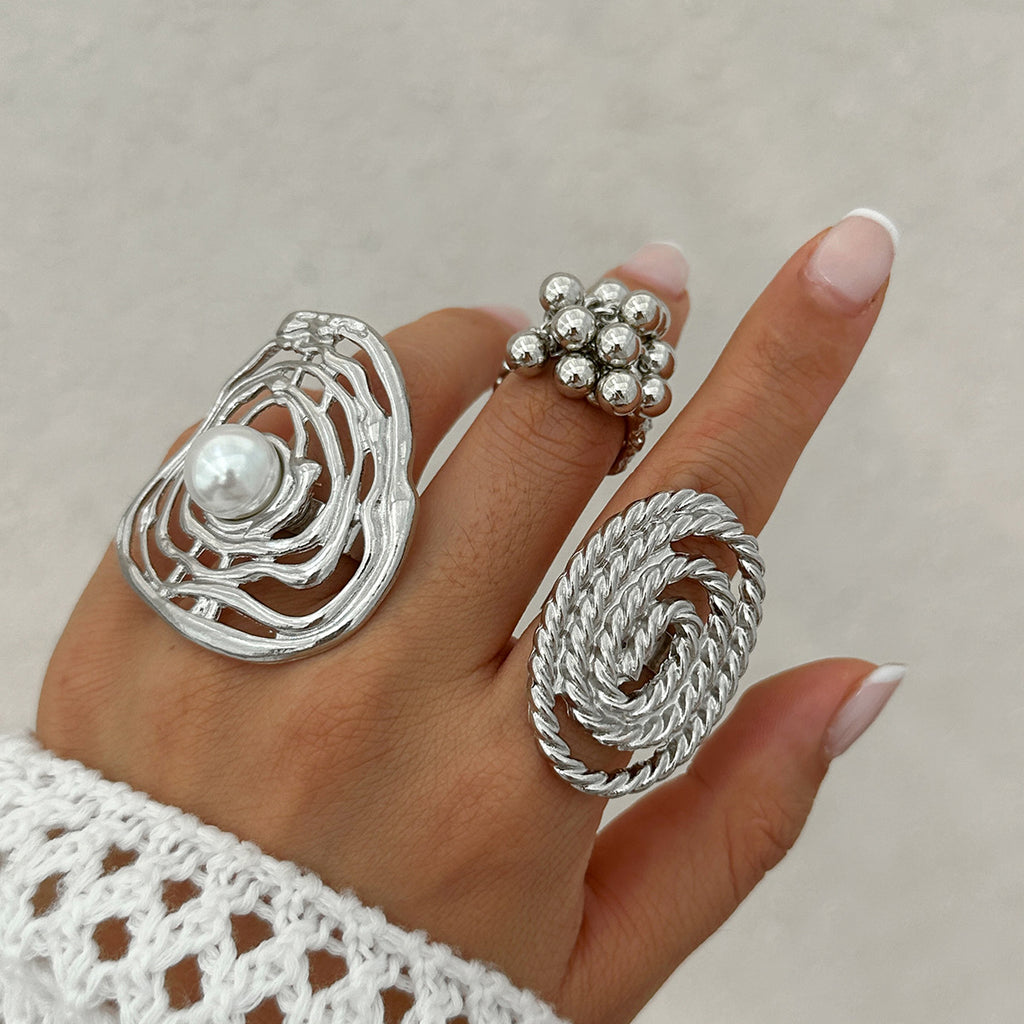 Geometric ripple imitation pearl ring, irregular elliptical alloy winding ring