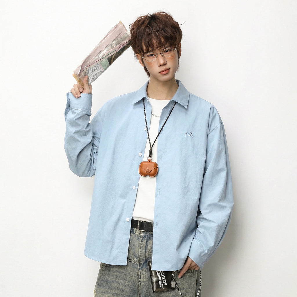 Solid color loose long sleeved shirt for men